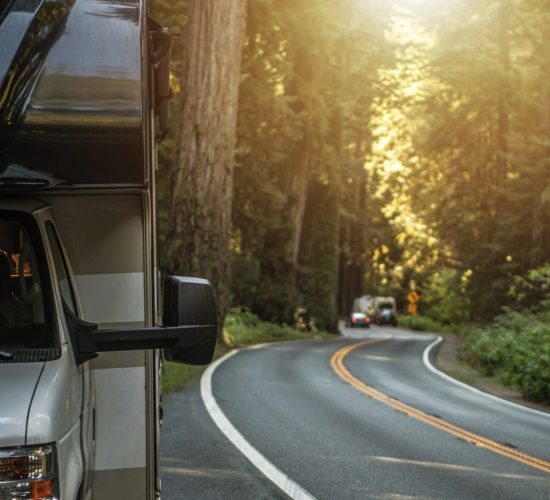 Class C Recreational Vehicle Motorhome on the Scenic 101 California Highway Panoramic Photo. RV Road Trip Theme.